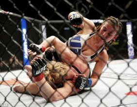 holly-holm-pokonana-miesha-tate-zwyciezyla-z-holly-holm-ufc-196-12-e1457257409483.jpg